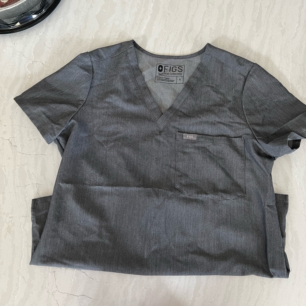 Like new FIGS graphite Catrina scrub top. Size Small
